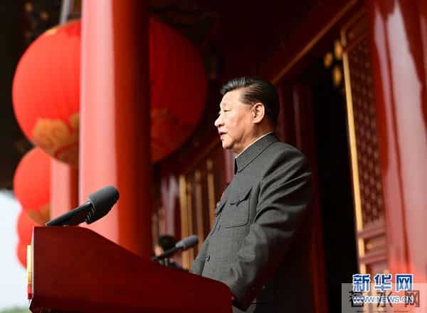 新华网评:为昨天喝彩 为明天拼搏