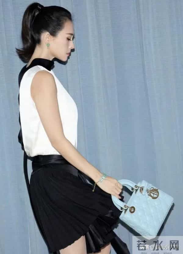 章子怡出席北京Dior之家开幕,穿米色长款外套,压轴出场大气漂亮