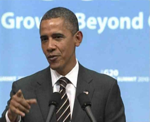 奥巴马在回答提问。